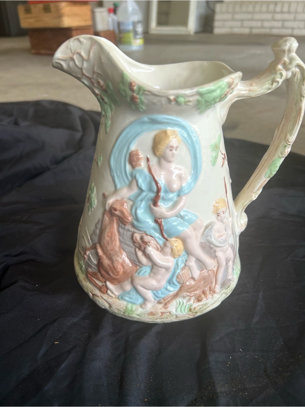 Ornate Pastel Ceramic Pitcher with Cherub Relief